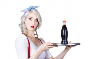 Pinup girl waiter with soda